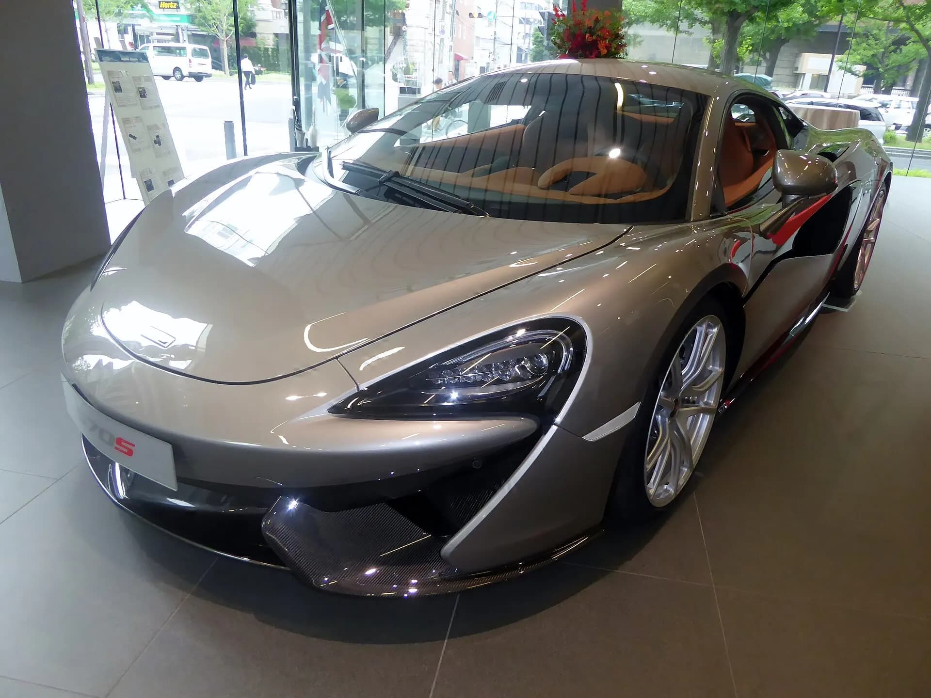 Silver McLaren 570S front three-quarter view