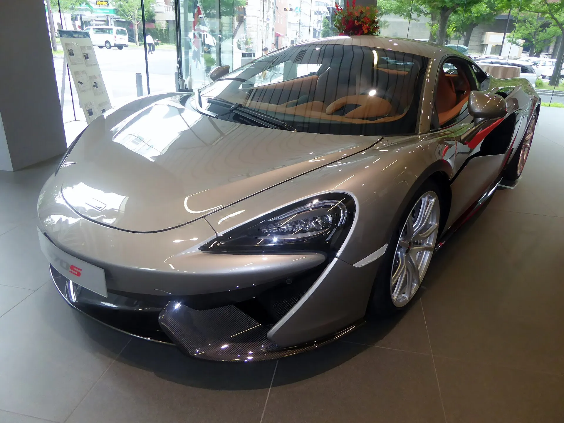 Silver McLaren 570S front three-quarter view
