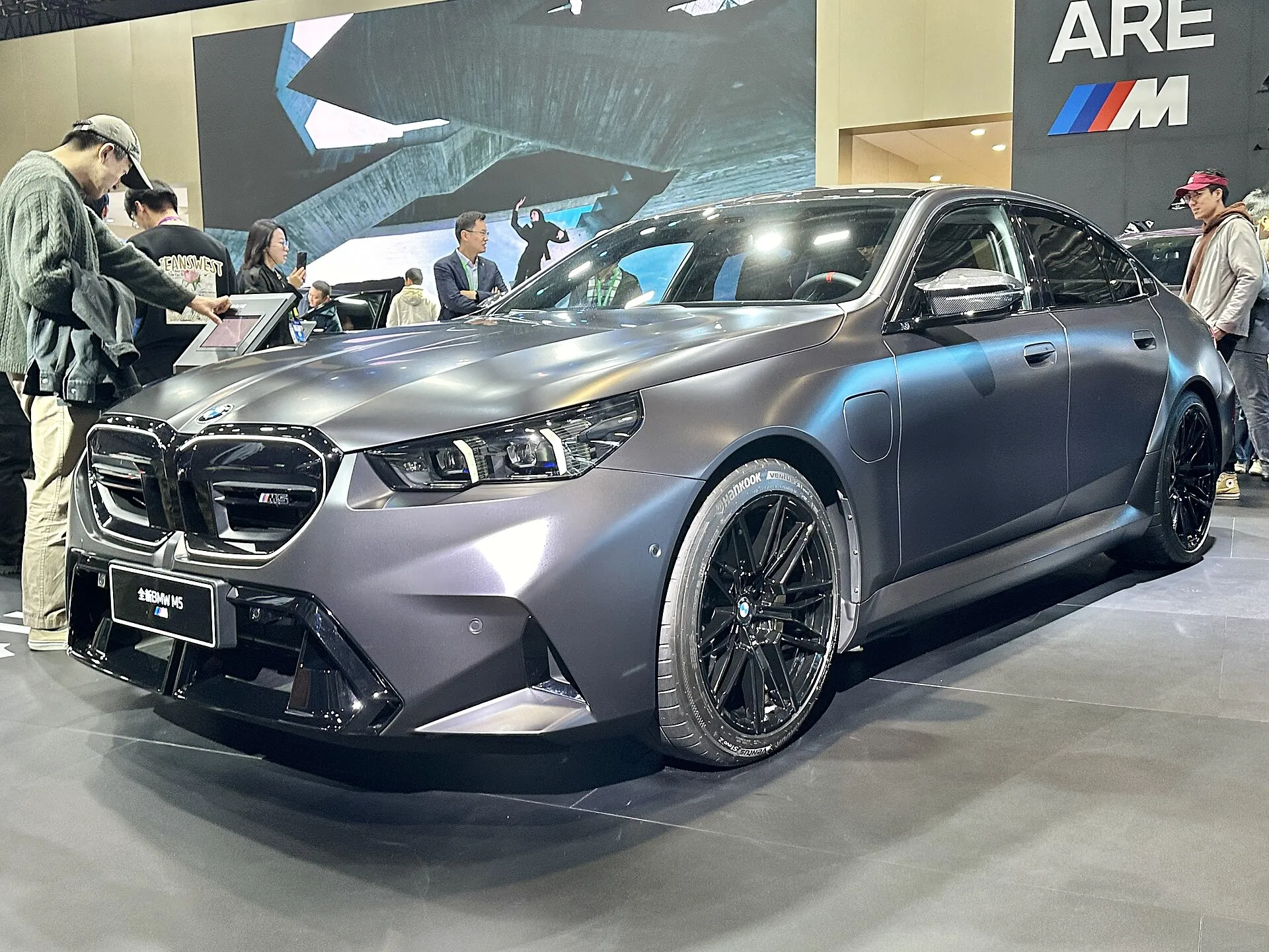 Grey BMW M5 front three-quarter view